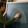 Student explaining a complex concept using the Feynman Technique