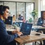 Male student on laptop connected digitally to male mentor smiling background.